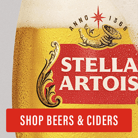 Close up of a Stella Artois Pint Glass with condensation appearing on the outside of the glass.